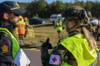 Samvirke mellom politiet og sanitetsbataljonen. *** Local Caption *** Collaboration between police and medical battalion.