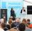 Julie Helseth Udal og Andé Pettersen på scenen på Kongsberg Agenda med publikum i salen. 